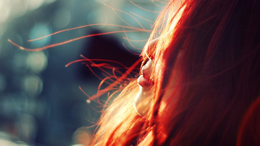 Beautiful Girl with Red Hair and Cute Lips