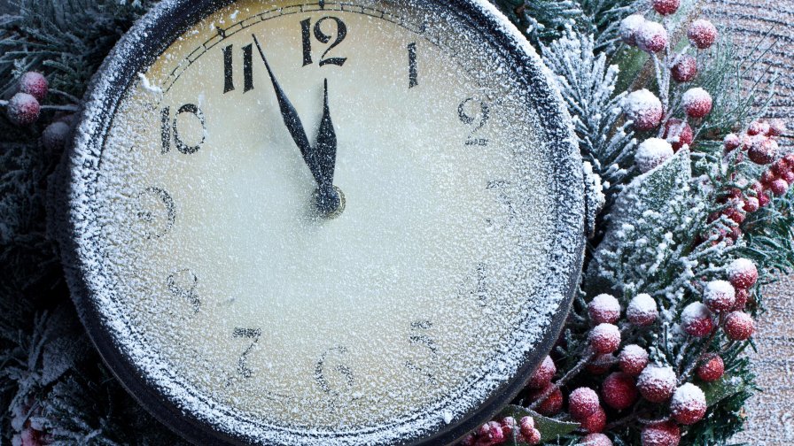 Beautiful Old Clock with Snowflakes Close Up