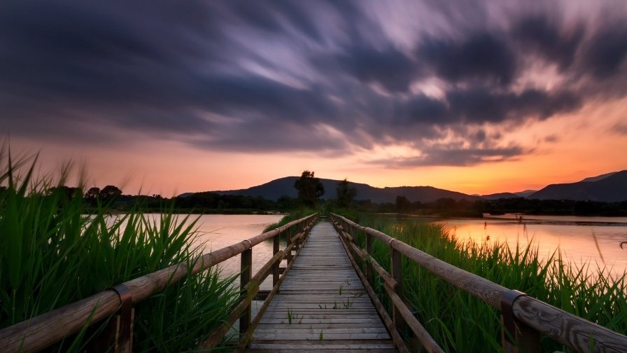 Beautiful Sunset and Single Bridge on the Lake