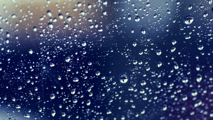 Beautiful Water Drops on the Glass