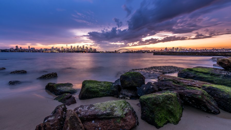 Big Green Stones on the Coast and Sunset