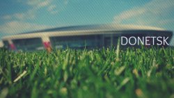Donetsk Donbas Arena and Green Grass in The Garden