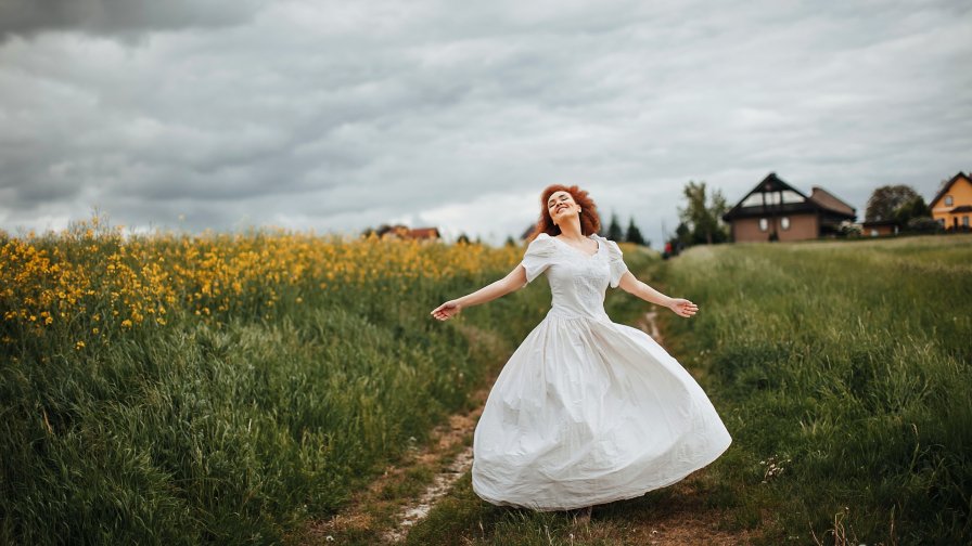 Pretty Redhead Girl in the Field