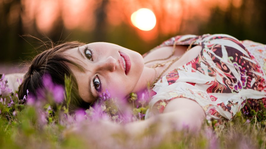 Pretty Teen Girl on the Green Grass