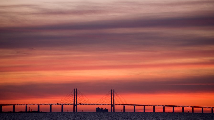 Red Sky with Clouds and Bridge