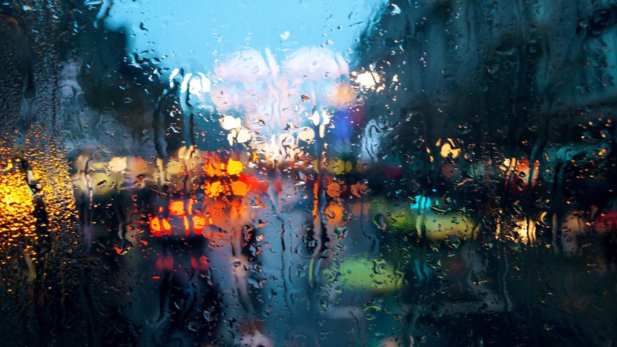 Water Drops on the Glass and Big City