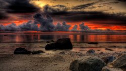 Wonderful Red Sunset and Rocks on Coast