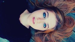 Young Beautiful Girl Looking on Sky