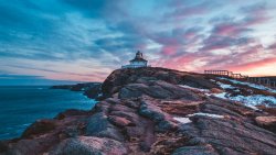 Lighthouse on Rocks and Beautiful Dusk